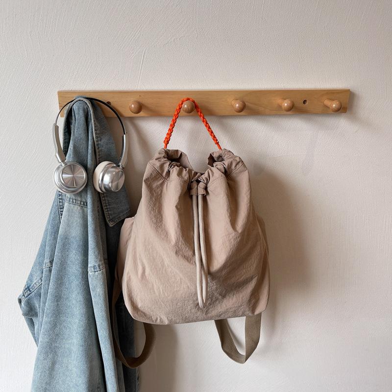 

Нишевый рюкзак на шнурке женский корейская версия бандл высокоценная тканевая сумка большой вместимости студенческий школьный рюкзак легкий дорожный рюкзак хаки