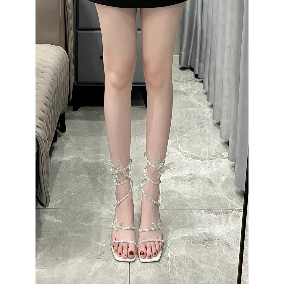 Bow rhinestone high-heeled sandals women's 2025 summer new thick-heeled snake-shaped wrapped open-toed Roman high heels