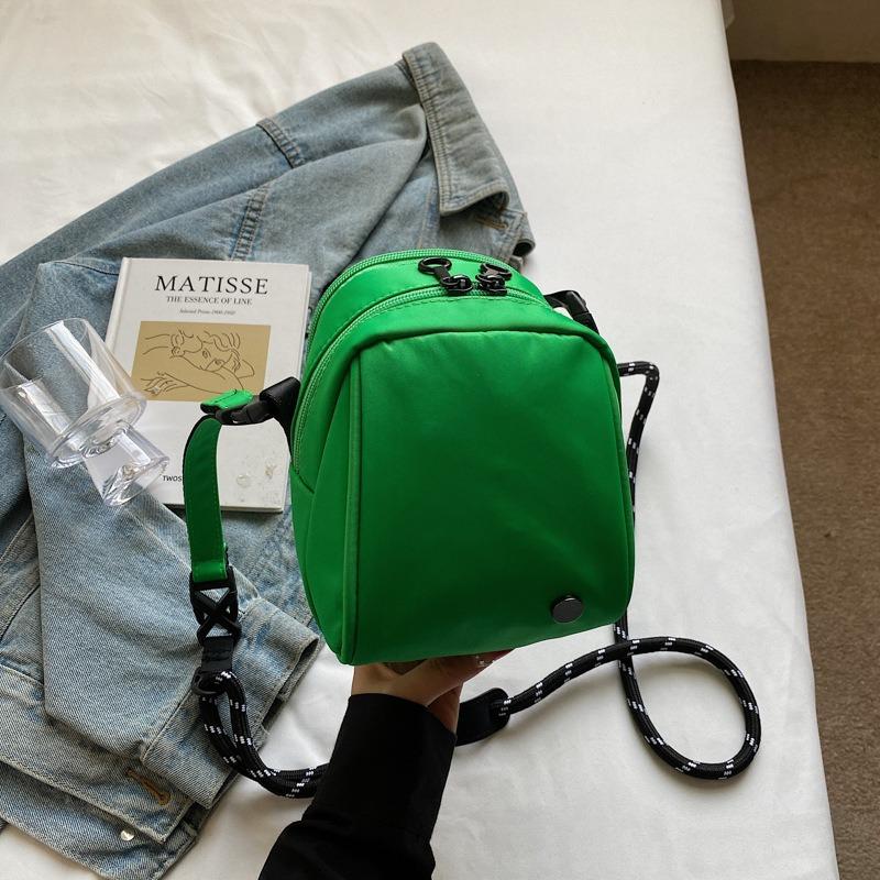 Kontrastfarbe Avocado Frühling und Sommer Tasche Damen neue trendige Mode lässige Messenger Muscheltasche vielseitiger Rucksack