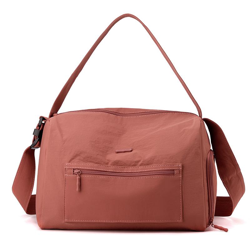 

Leisure travel bag Large capacity going out Short boarding duffel bag Lightweight versatile nylon sports fitness bag