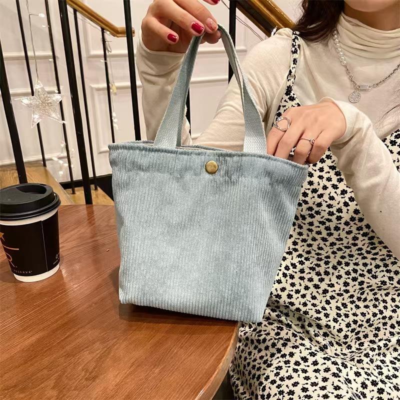 

[] New literary corduroy bag portable casual versatile women s mini handbag retro cloth bag світло-синій колір