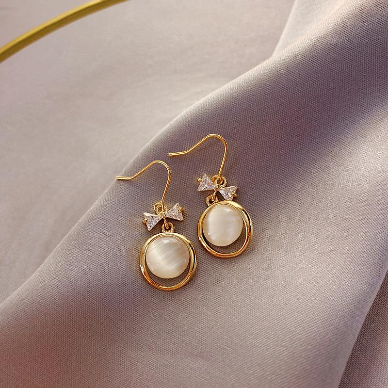 

Korean Minimalist Zircon Bow & Cat s Eye Stone Dangle Earrings for Women