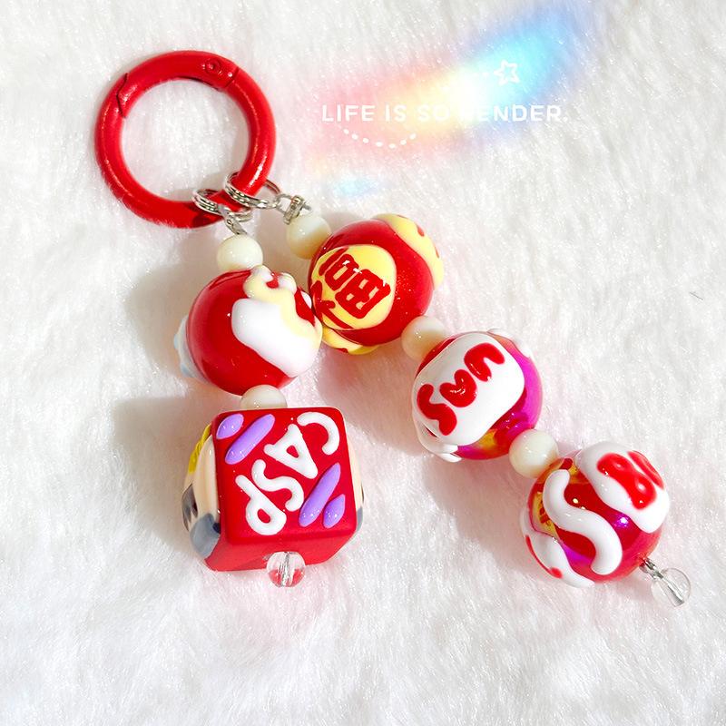 

Короткий бисерный брелок для ключей, симпатичная мини-кукла, ремешок для телефона, ремешок на запястье, подвеска для рюкзака, украшение ручной работы, веревка для телефона, защищающая от потери красный