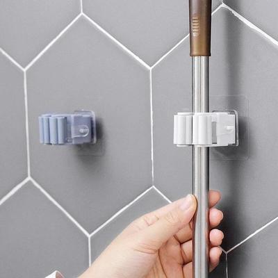 Multi-functional Adhesive Multi-Purpose Hooks Wall Mounted Mop Organizer Umbrella Holder Home Brush Broom Hanger Storage Rack