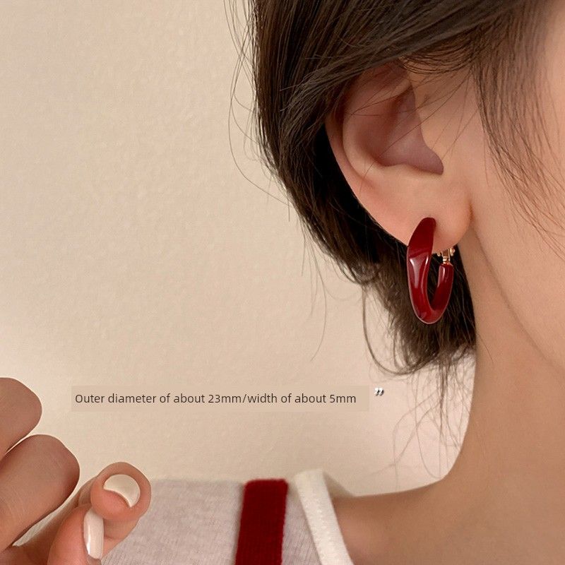 

[Сяннань] 999 Иньань Кела Серьги-кольца с красным ушком Специальный дизайн Простой браслет Серьги для женщин 2025 Новые серьги-гвоздики 999 silver needle Ankola red ear ring (two price)
