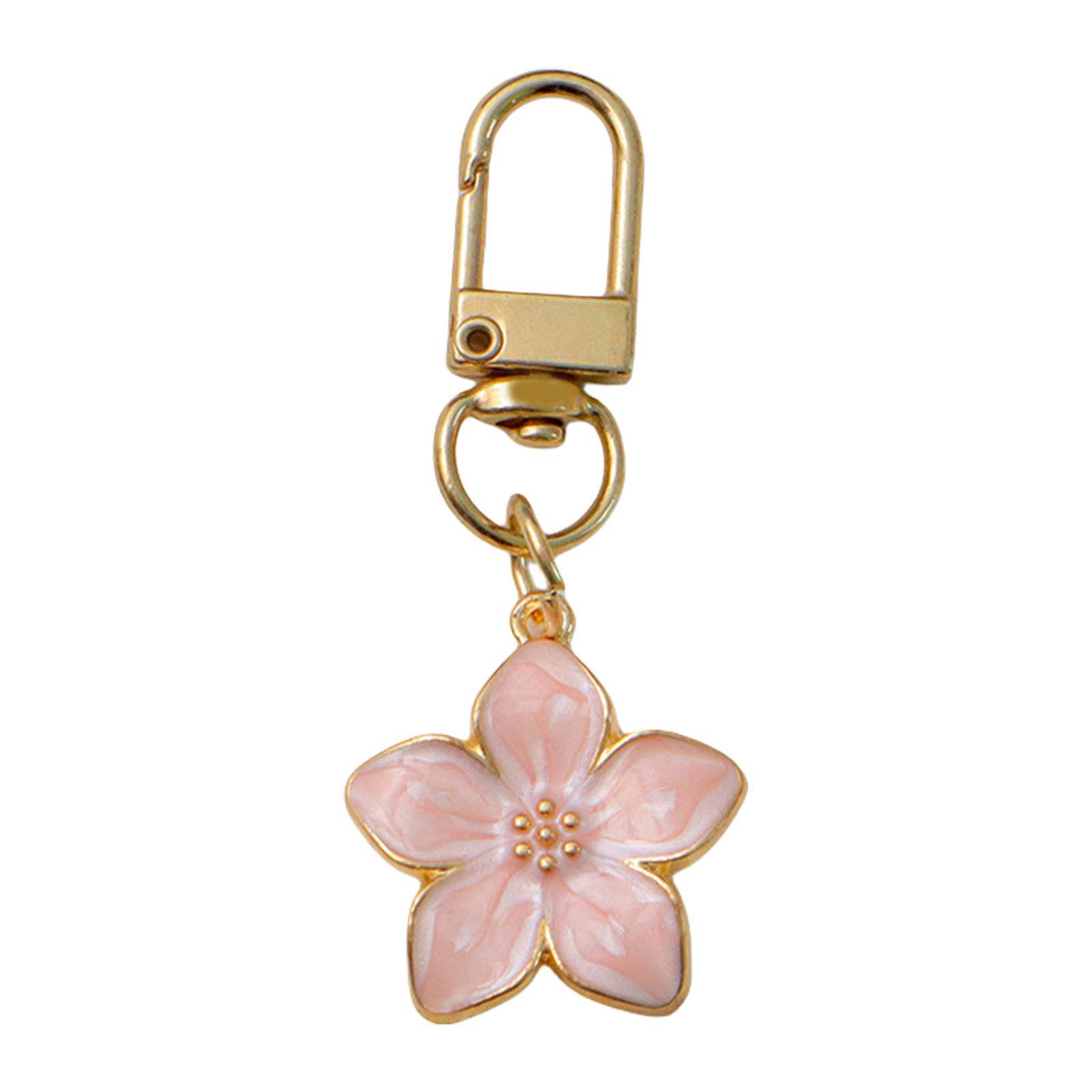 

Модный брелок для ключей с цветком, аксессуар, портативный держатель для ключей, трендовый шарм для сумки, текстура сплава, подходит для любителей путешествий розовый