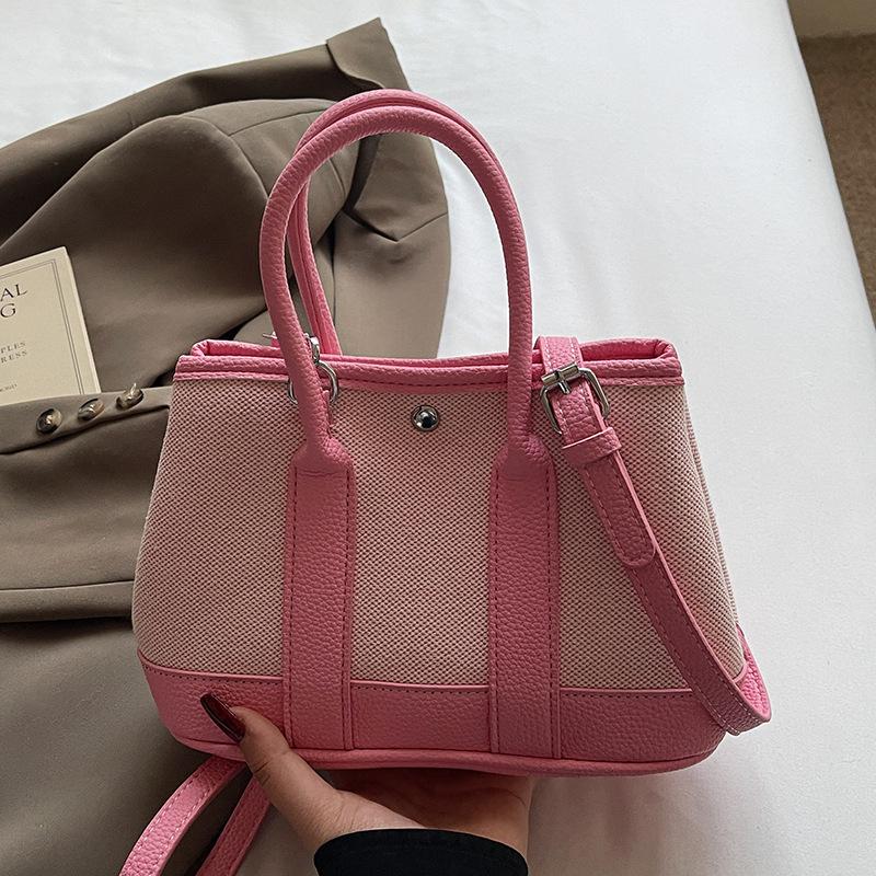 Wholesale Korean version of casual niche contrasting color portable bucket bag commuting versatile simple personality messenger women's bag