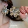 Three-dimensional pleated metal flower stud earrings women's exaggerated atmosphere earrings temperament earrings light luxury