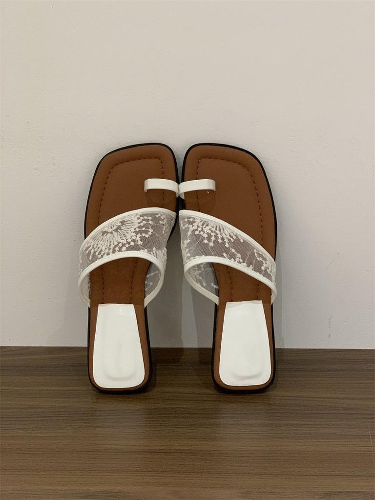 Cool slippers women's outer wear summer 2025 new French fashion casual beach lace thick heel pinch toe half drag