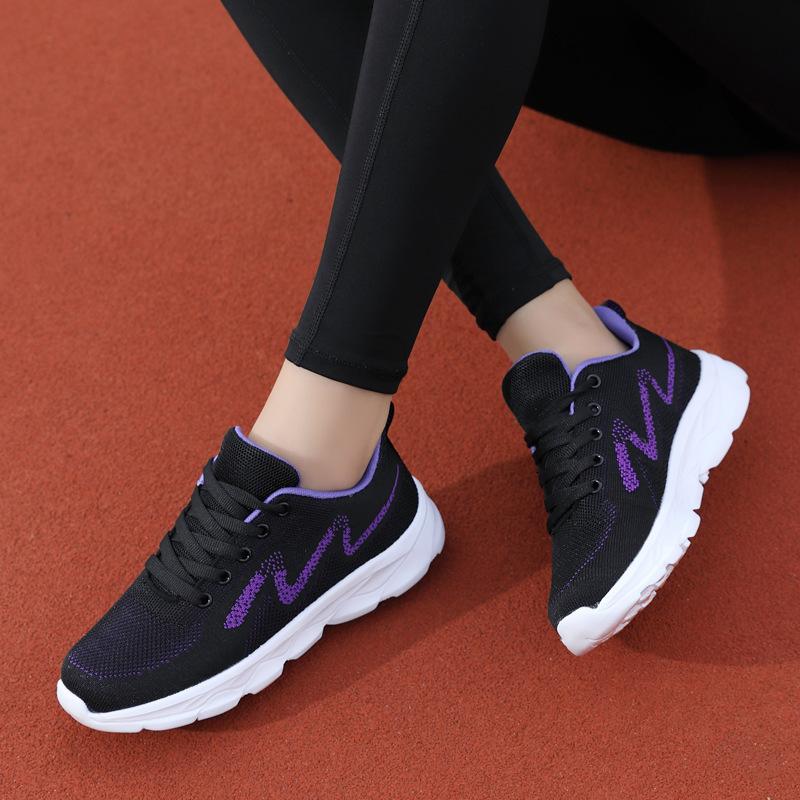 202 season new fly-woven sneakers women's black soft-soled casual running shoes women's breathable mesh travel shoes