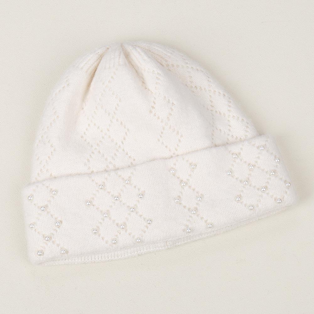Autumn and winter new warm little pearl fashion knitted hat outdoor riding windproof and cold thickened versatile wool hat