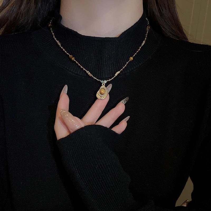 Maillard Vintage Oval Tiger Eye Long Necklace: Niche Light Luxury Sweater Chain for Women