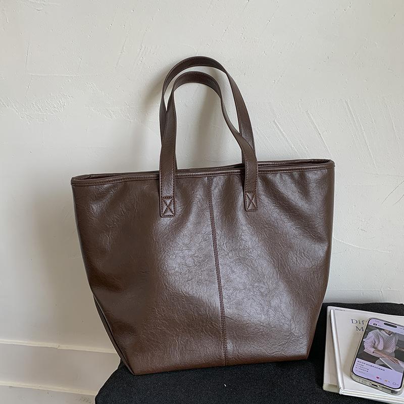 2025 early autumn new commuter retro simple large-capacity armpit bag solid color shoulder bag college student tote bag women