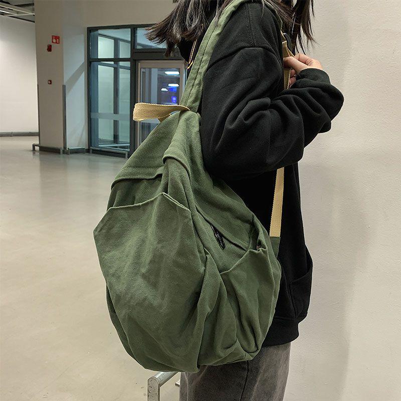 2025 Durable Canvas Solid Color Backpack for Female College Students - Korean and Japanese Style Travel Schoolbag