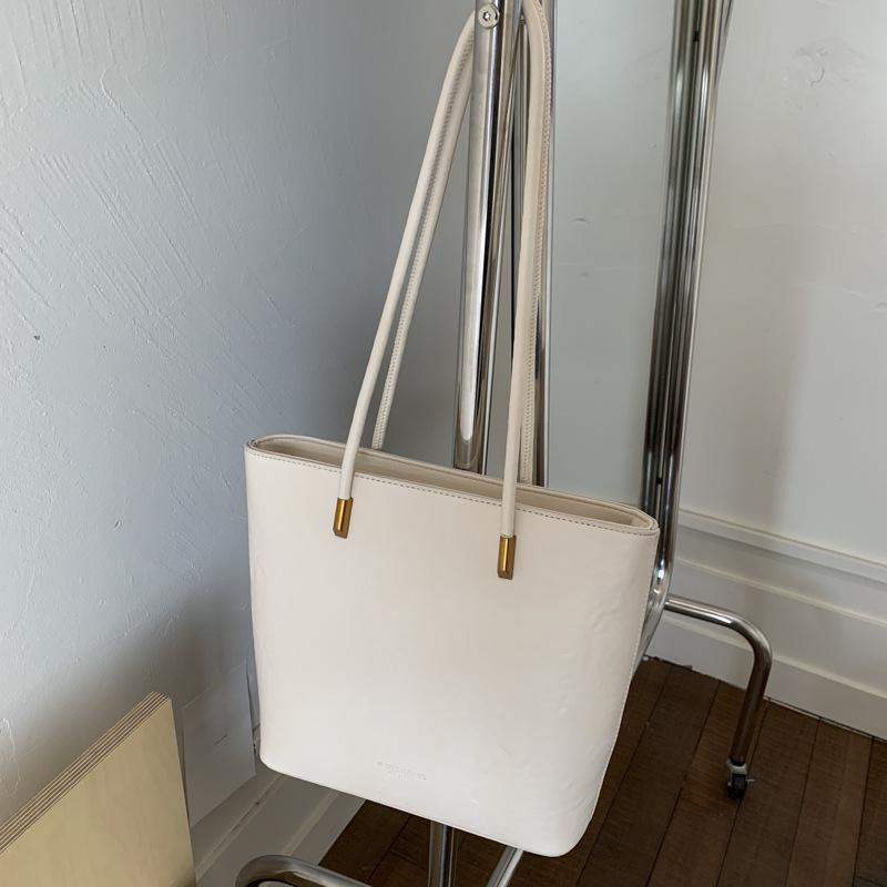 

Вместительная сумка-тоут женская новая осенне-зимняя ретро простая сумка через плечо с ощущением высокого класса рабочая сумка для поездок