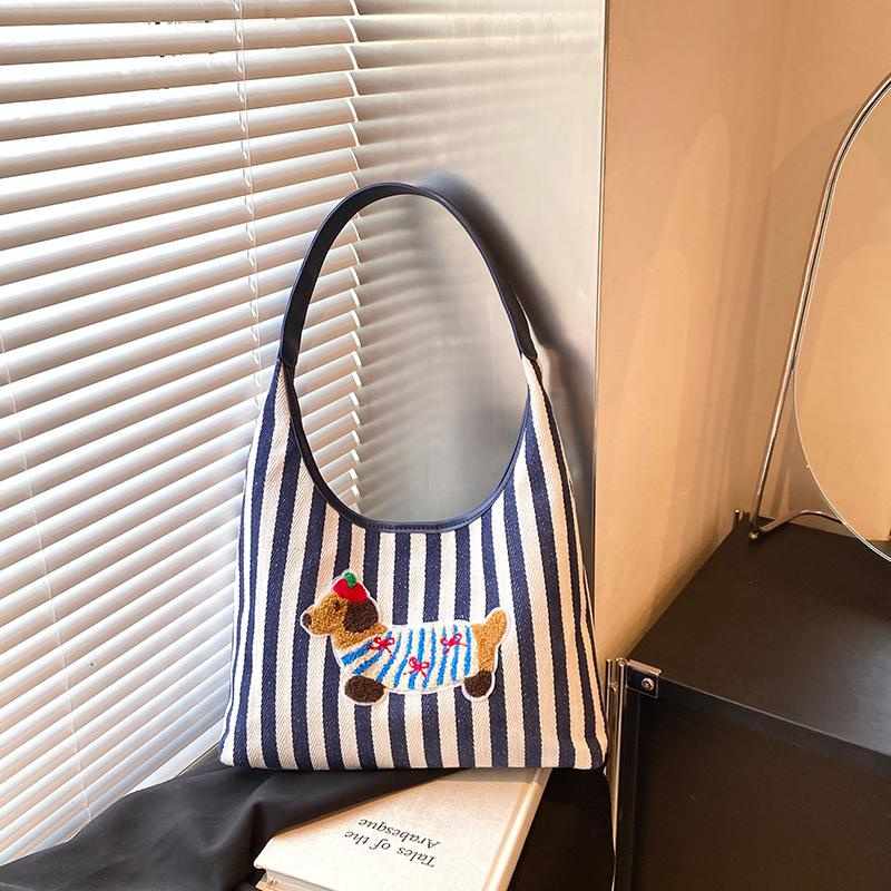 

2025 autumn new cute puppy pattern bag large capacity soft simple messenger shoulder bag commuter bag female синий