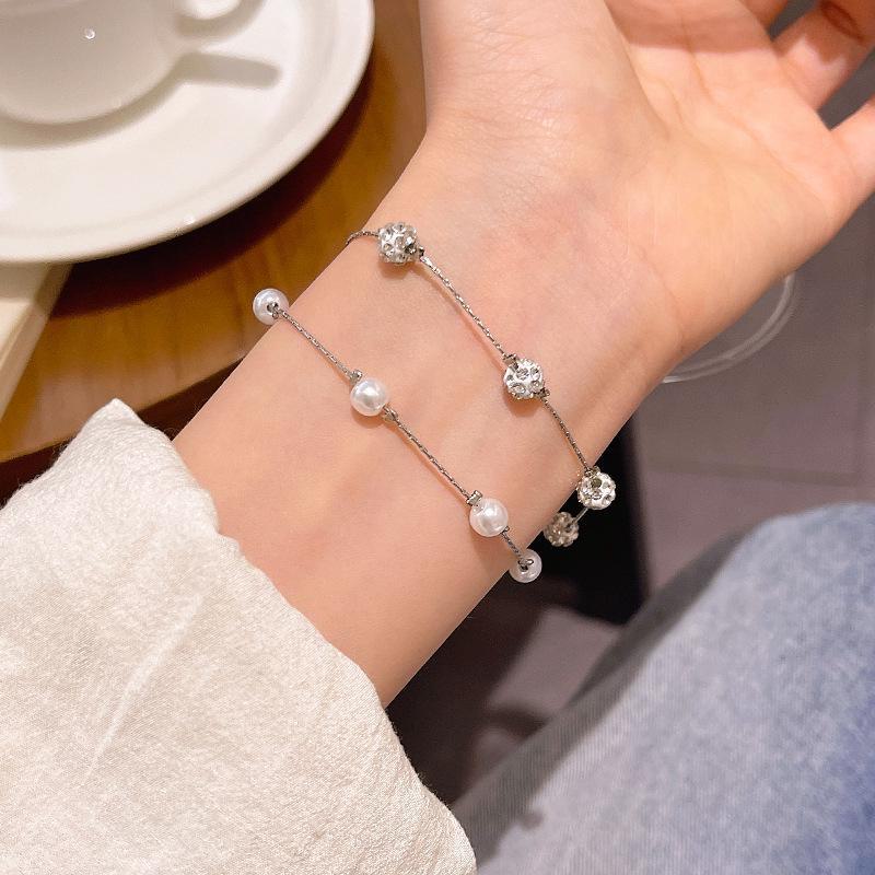 

Корейский двухслойный браслет из жемчуга со звездным небом и бриллиантовыми бусинами — в том же стиле, что и браслет Internet Celebrity S515 серебряный