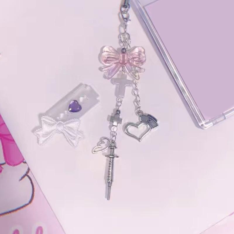 Niedlicher Spritze Schleife Kreuz Schlüsselanhänger Anhänger Tasche Handy Anhänger Damen Rucksack Handtasche Charme Reizende Hängedekoration