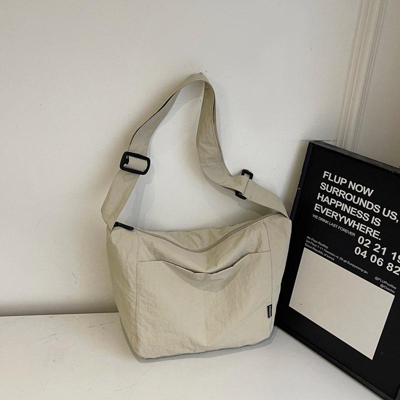 Japanese casual niche design crossbody bag one-shoulder summer cloth bag women's 2025 simple retro commuter tote bag