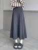 European, American autumn and winter new solid color elastic waist design sense texture medium and long versatile skirt foreign style knitted skirt