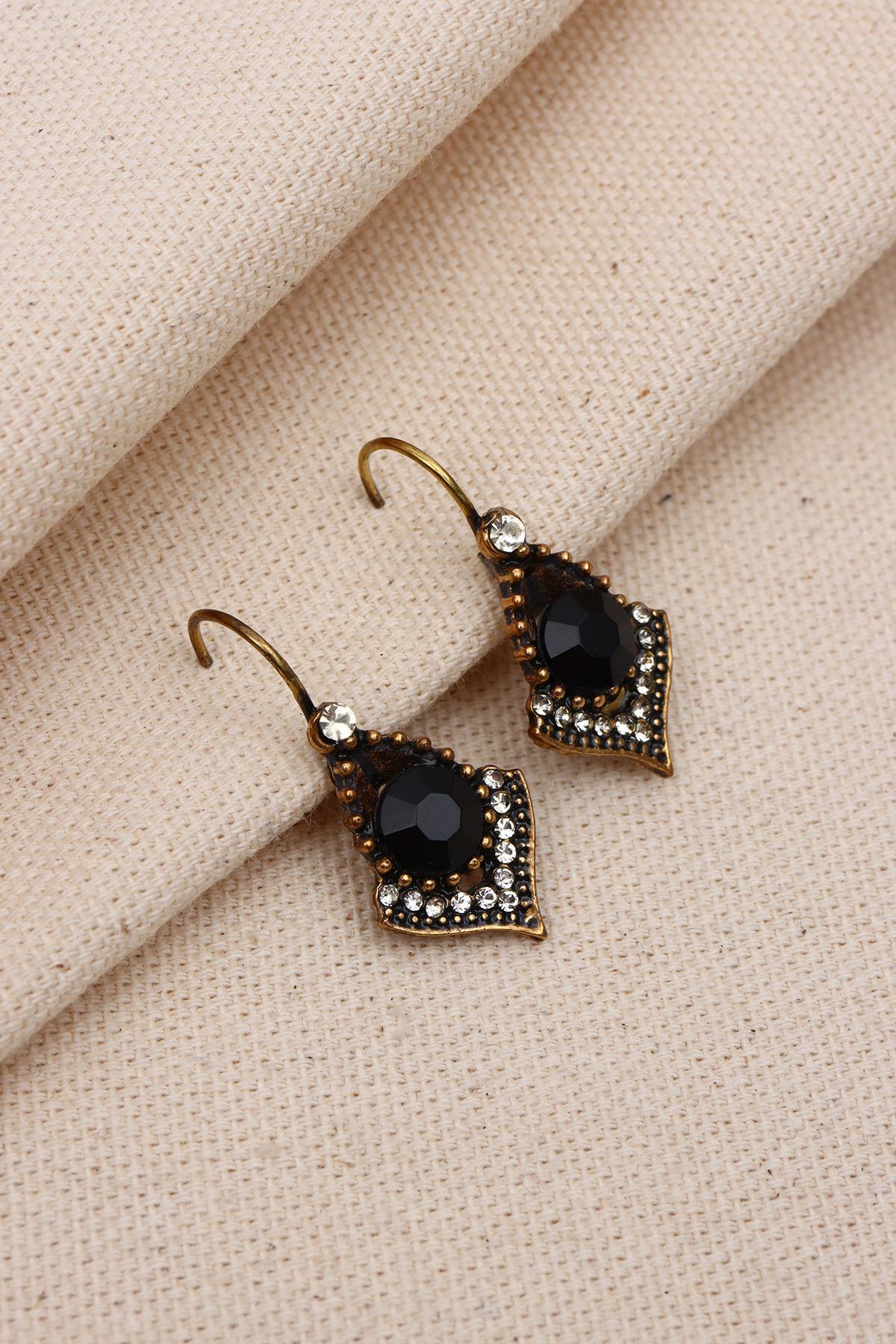 

Настоящие серьги с черными камнями