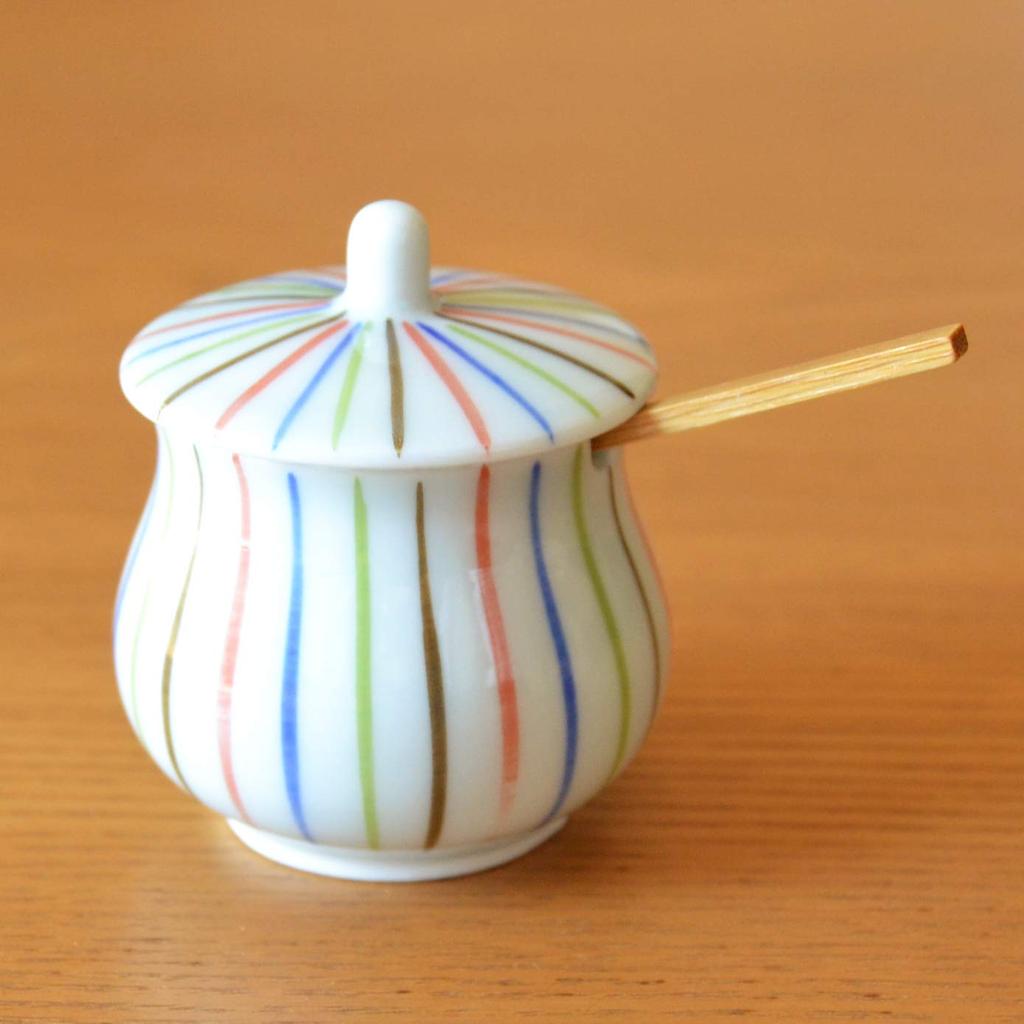 Stylish ceramic condiment container with lid and bamboo suitable for commercial or home Made in Japan by Arita spoon, use. ware, "Yoshiki Tokusa"