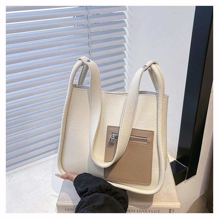 Women's bag spring new simple and fashionable contrasting colors lychee pattern shoulder bag texture child and mother small square bag tide