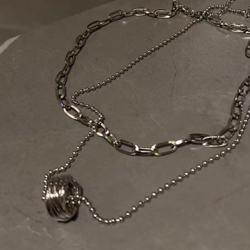 Double-layer stacked circle necklace female niche design high-end sweater chain new autumn and winter accessories