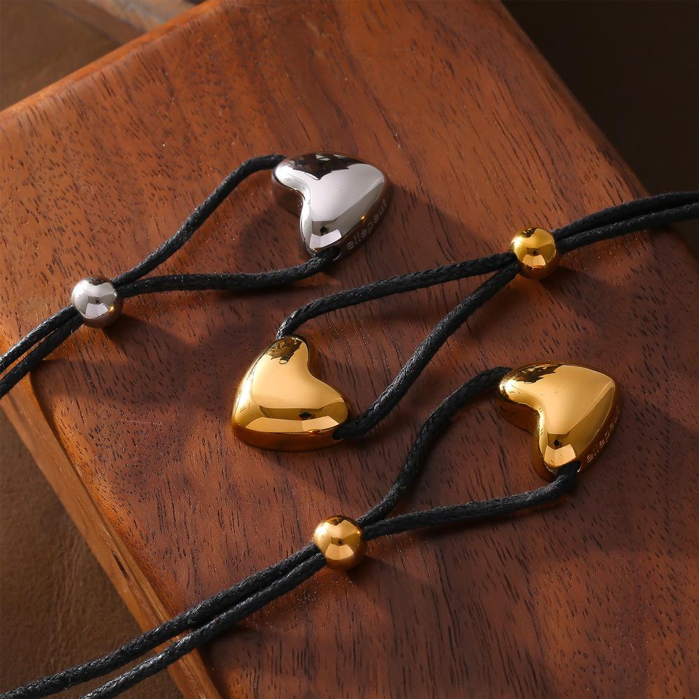 

Retro Korean Long Black Rope Heart Pendant Necklace – Titanium Steel Choker for Women