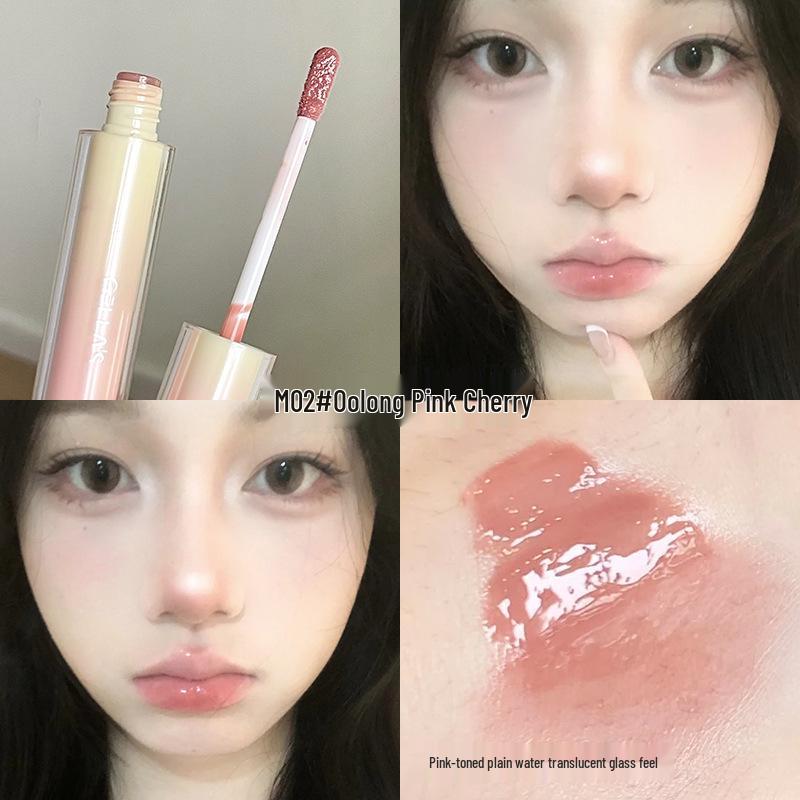 Gellas Mirror Shine Lip Gloss: Watery, Translucent Finish for Brighter Skin and Plump, Glassy Lips; Available In Nude and Milk Tea Shades.