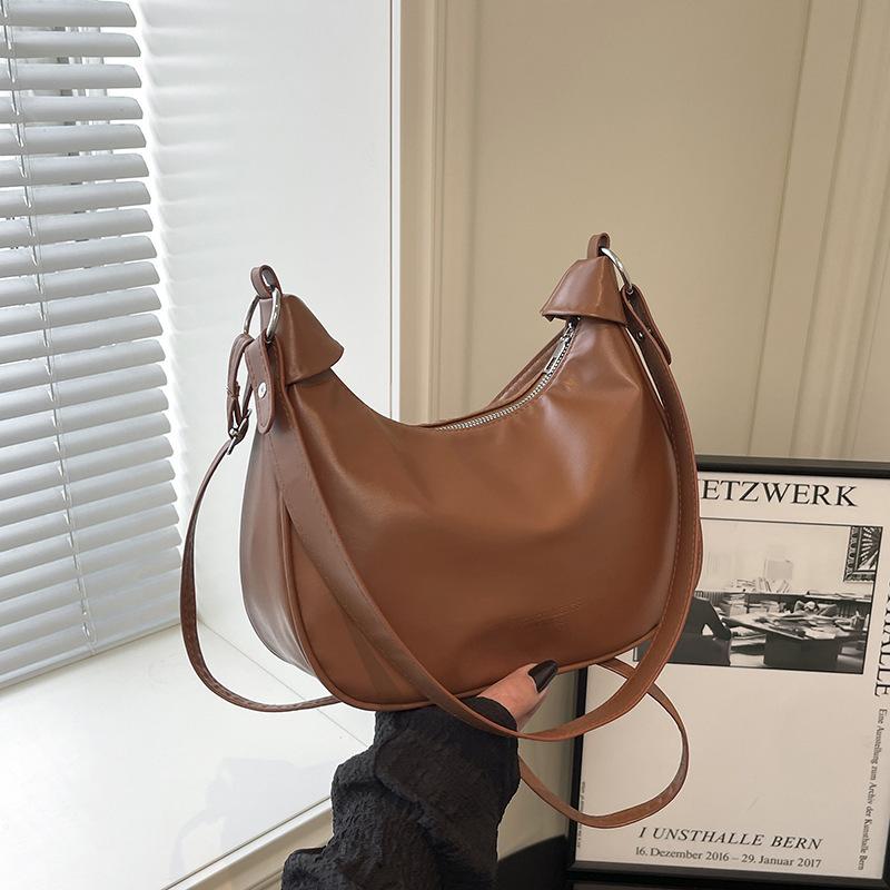 

Niche design crescent bag soft leather underarm bag women s 2025 new simple high-end shoulder crossbody versatile women s bag коричневый