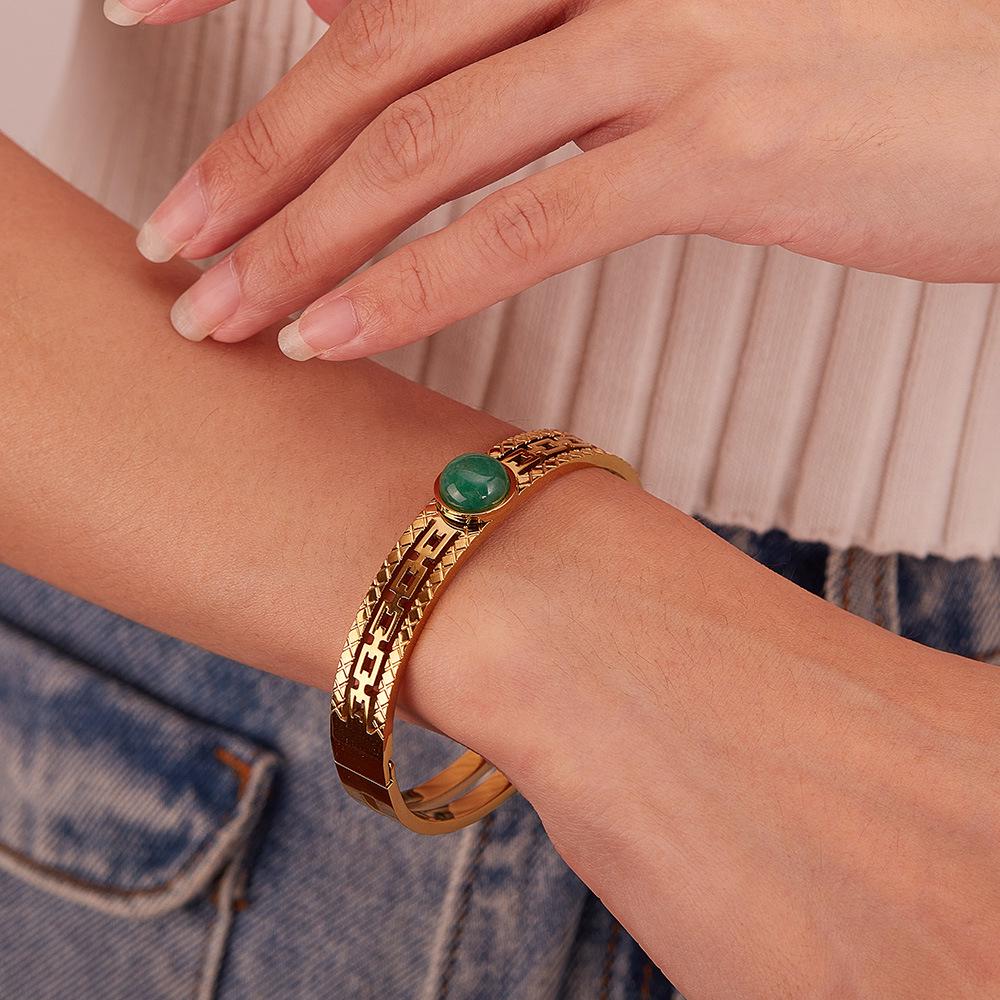 Elegant Titanium Steel Women's Hollow Bangle: European-American Fashion, Light Luxury, and Versatile Accessory