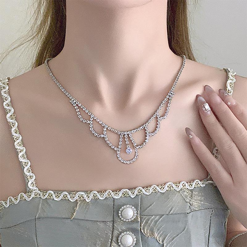 2024 Summer Women's Zircon Collarbone Necklace and Light Luxury Earrings with Bracelet – Trendy High-End Accessories.