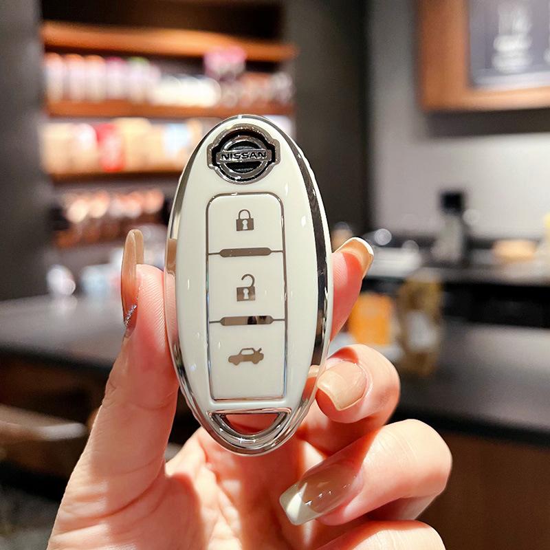 

Suitable for Nissan Qijun key set All-inclusive Tule car buckle Loulan Teana Bluebird Xuanyi high-end protective buckle case
