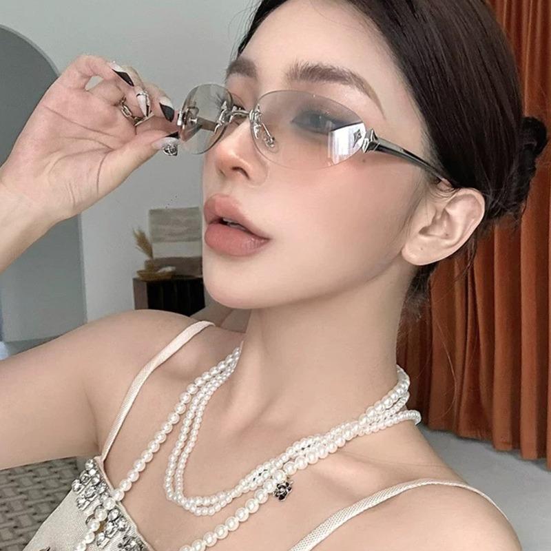 2026 Fashion Rimless Sunglass for Women Men Vintage Star Shaped Small Oval Frameless Y2K Blue Light Blocking Glasses Daily Wear
