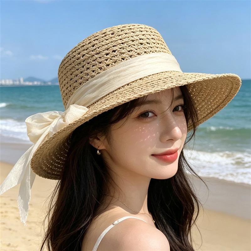 Hollow raffia simple webbing bow flat top hat women's summer elegant versatile sunscreen straw hat vacation beach hat