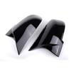BMW 5 Series F10/F18 Horn Style Rearview Mirror Housing Backup Camera Cover, Glossy Black Carbon Fiber Pattern.