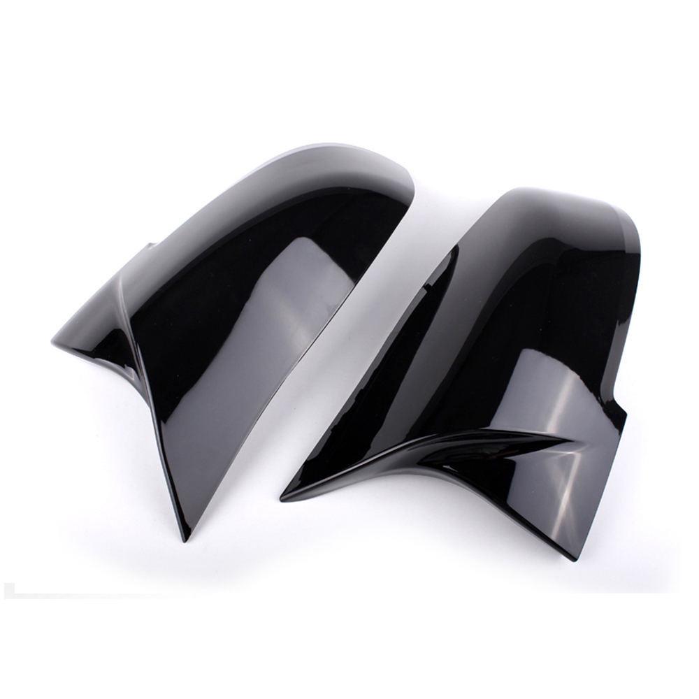 BMW 5 Series F10/F18 Horn Style Rearview Mirror Housing Backup Camera Cover, Glossy Black Carbon Fiber Pattern.