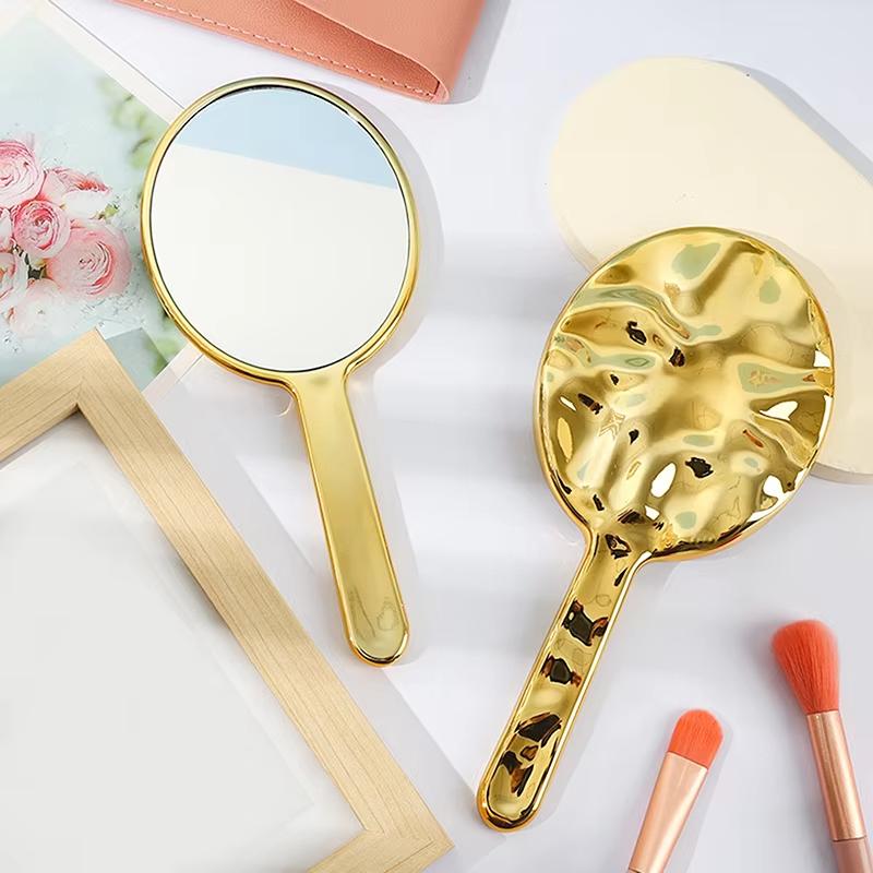 Flüssige Ellipsoidform Spiegel Handgehalten Desktop Kosmetik Make-up Spiegel Reise Tragbar Schönheit Glänzend Silber Spiegel für Handtasche