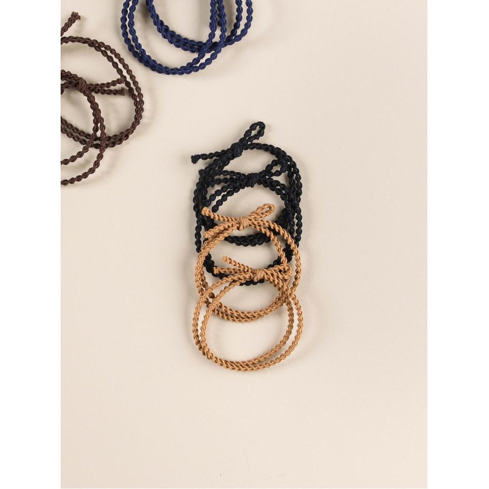 

Daiso Solid Color Twist Knot Ring Rubber Bands Pack Of 4 gold