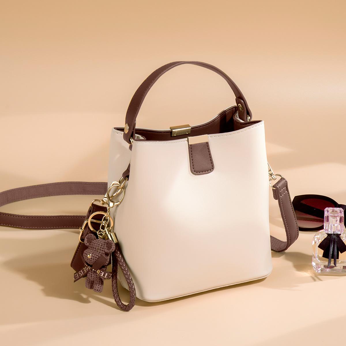 Women s handbag 2024 new summer bucket bag, soft leather, niche design, fashionable and versatile, textured crossbody bag