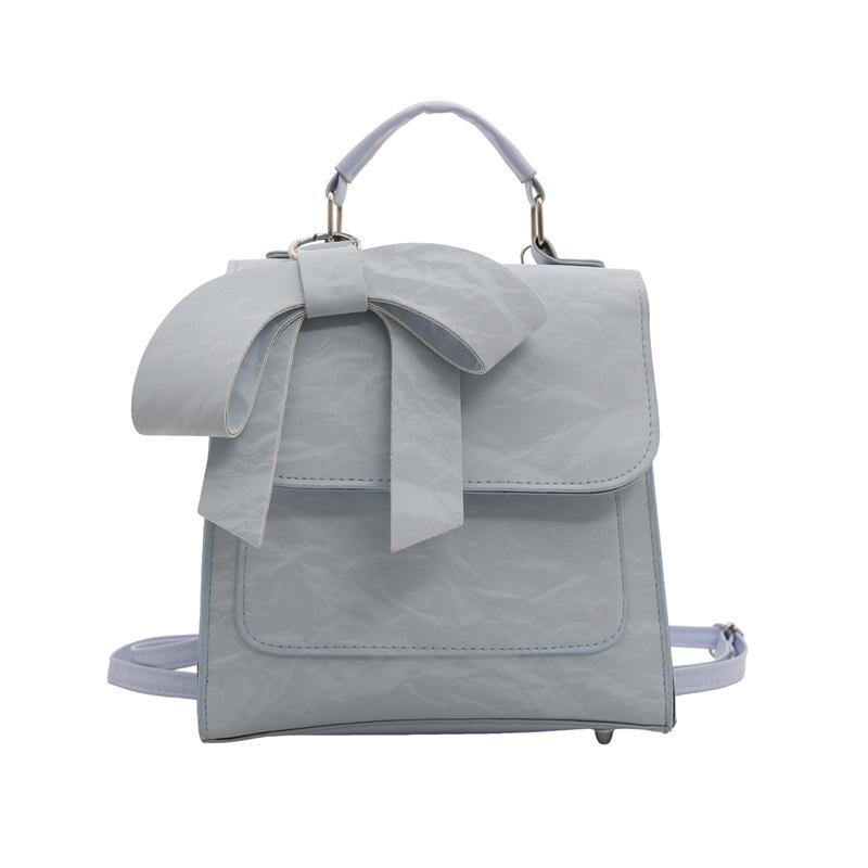 

Сумка-рюкзак у корейському іноземному стилі, жіноча сумка 2024 року, новий милий маленький рюкзак із бантом, нішовий дизайн для приміських поїздок синій