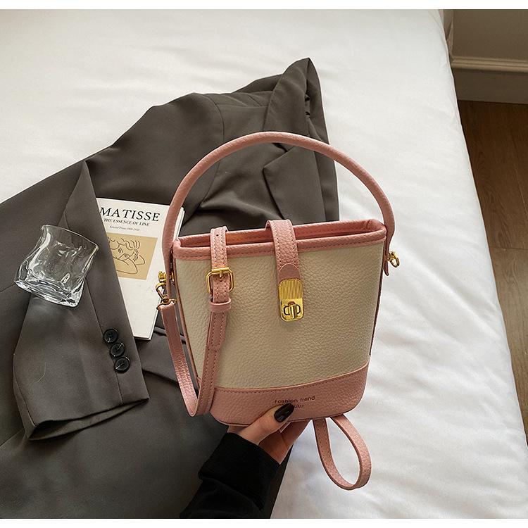 High-end niche contrasting color small bucket bag women's 2025 new Korean version fashion one-shoulder portable messenger bag