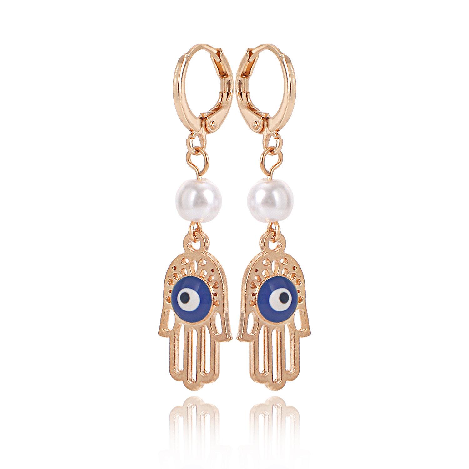 

Fashion Personality Devil s Eye Palm Pearl Earrings Women, Popular Creative Earrings in Europe and America золотой