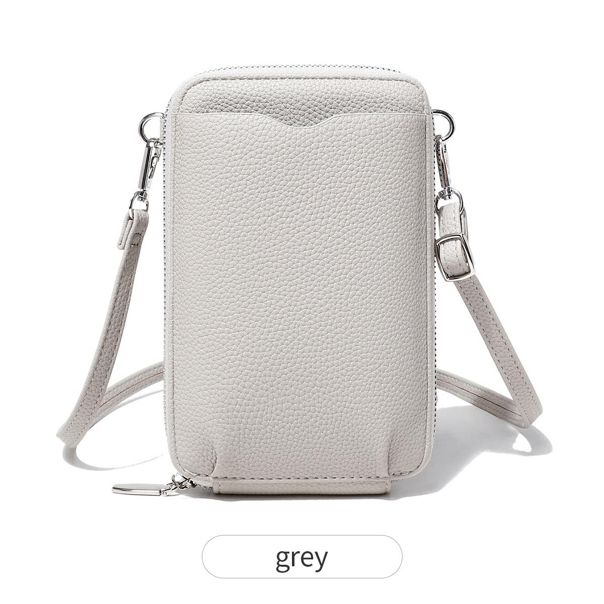 

New lychee pattern soft leather vertical zipper mobile phone bag large capacity women s shoulder bag crossbody bag сірий колір