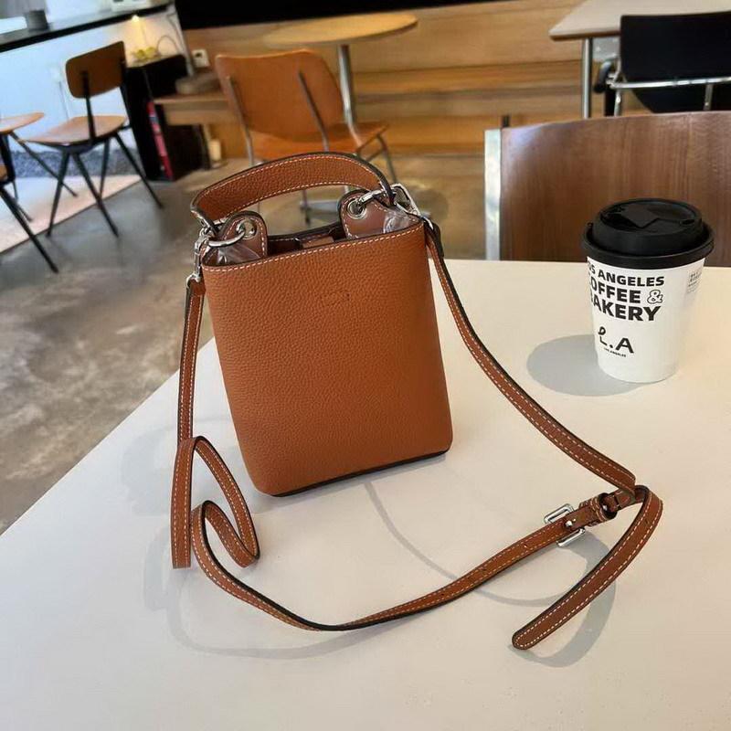 2025 New Genuine Leather Women's Bag Top Layer Cowhide Mini Bucket Bag Color Blocked Tote Phone Bag Hand-held Single Shoulder Diagonal Cross