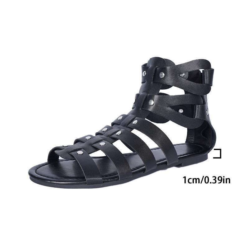 

Мода 2025 Римские сандалии для женщин на лето с открытым носком Модные с заклепками Повседневная женская обувь Новый большой размер Удобные плоские сандалии 42 чёрный