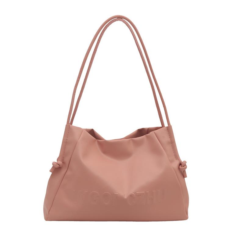 

Корейська нішева сумка на плече великої місткості 2024 літо нова іноземний стиль універсальний дизайн сенс сумка-тоут для поїздок на роботу тренд рожевий