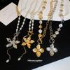 Retro Pearl Beaded Metal Pleated Flower OT Buckle Necklace Premium Niche Temperament Clavicle Chain Jewelry