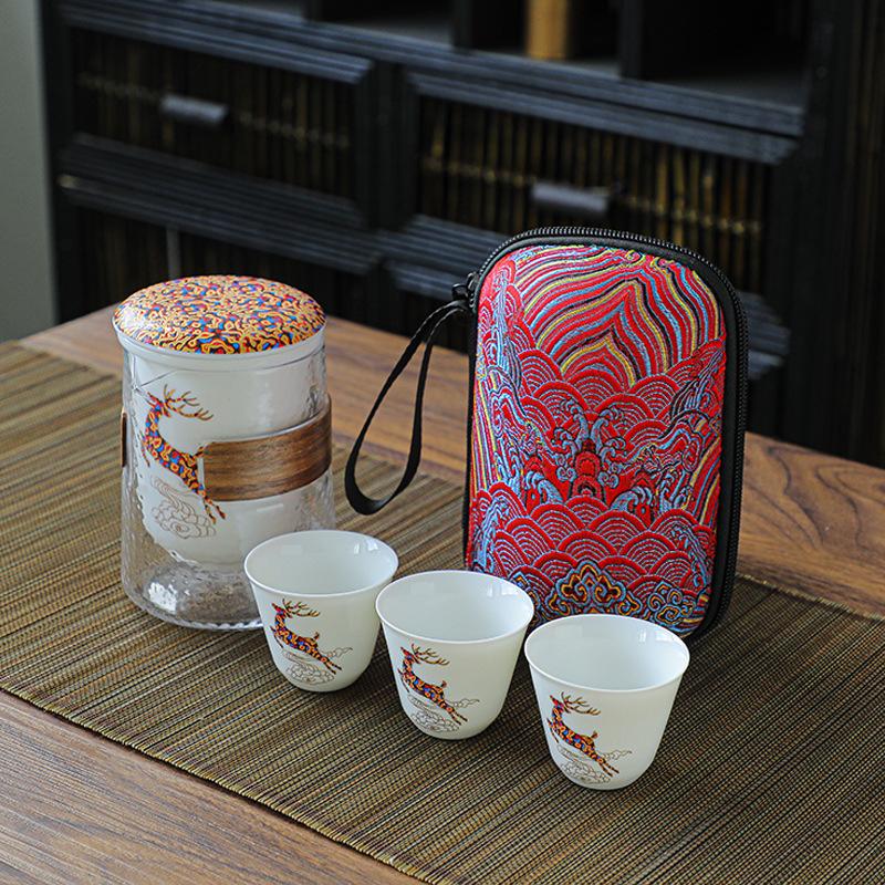 

Dehua ceramic tea set Kuaike Cup Yilu has your creative travel tea set, which can be filtered and portable.